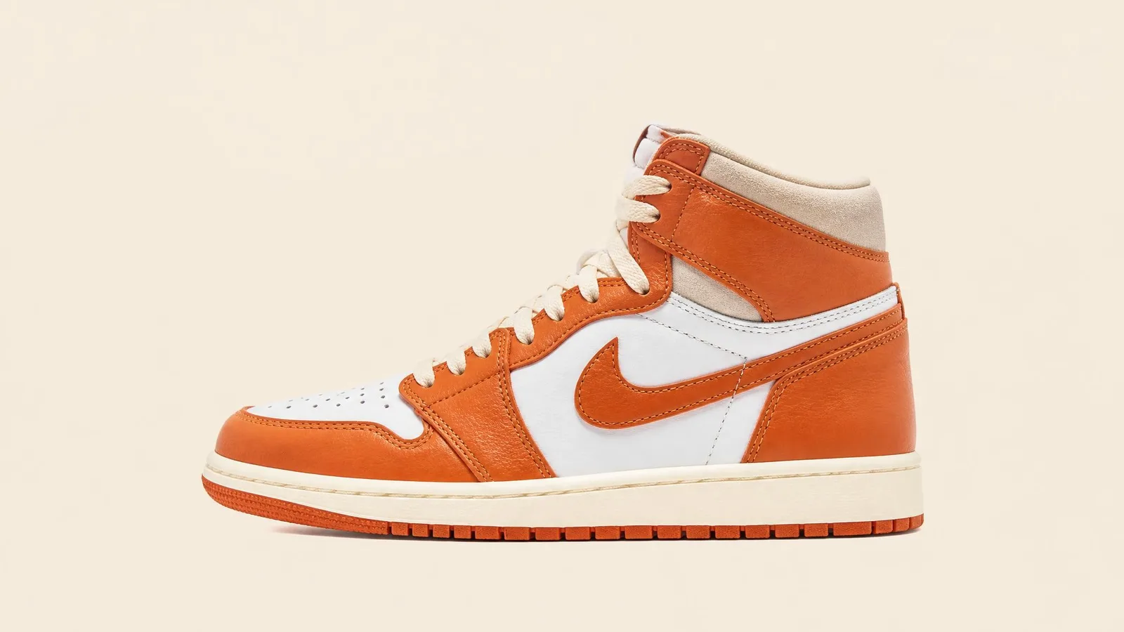 A single pair of limited-edition sneakers with terracotta-orange colourway detailing photographed in clean side-profile on a warm off-white surface, representing a carefully chosen pair that has earned its place in a downsized collection.
