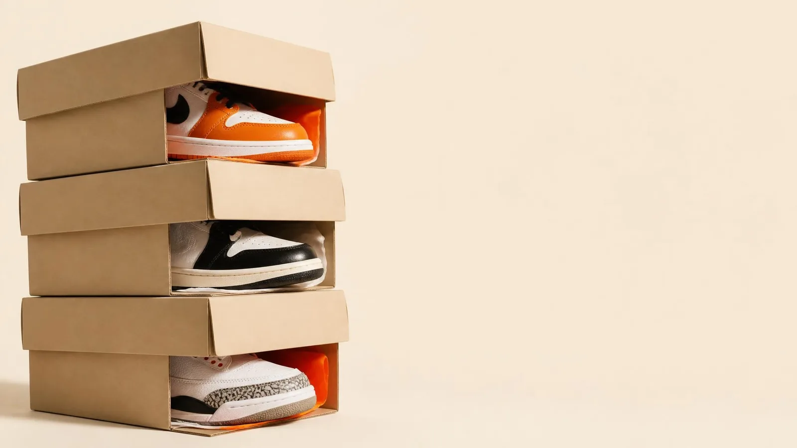Three stacked sneaker boxes with lids slightly open revealing different sneaker silhouettes inside, representing Nike's allocation of production runs across multiple factories and countries.