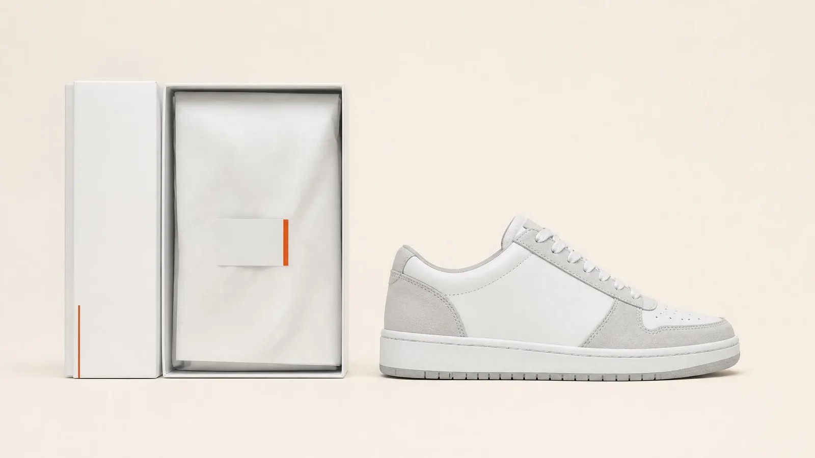A pristine deadstock sneaker displayed beside its open original box on a cream background, photographed in clean catalogue style to illustrate condition and completeness record-keeping.